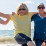 3 middle aged ladies enjoying the beach together